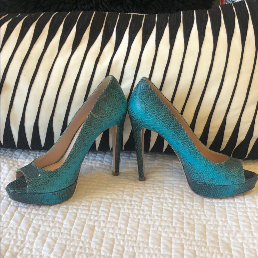 Miu Miu open toe pumps.